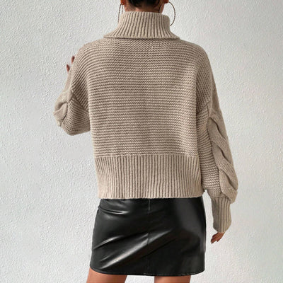 Pull torsadé uni au look confortable et chic