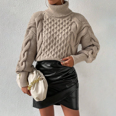 Pull torsadé uni au look confortable et chic