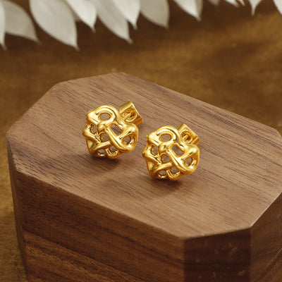 Boucle d'oreille d'acier inoxydable de coeur enroulé