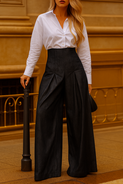 Jean taille haute élégant, coupe large sophistiquée.